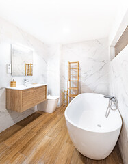 Clean bright bathroom interior with wooden floor, white toilet and marble tiles. Original designed...