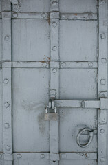 Padlock on the door. 