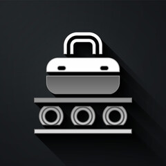 Silver Airport conveyor belt with passenger luggage, suitcase, bag, baggage icon isolated on black background. Long shadow style. Vector.