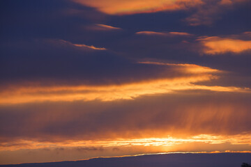 Fototapeta premium Sun in the clouds after dawn. 