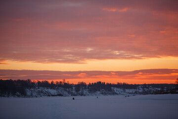 Winter sunset in the field. 