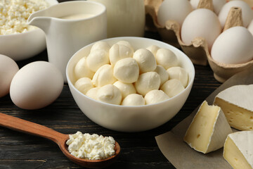 Different fresh dairy products on wooden background