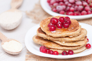 Healthy breakfast concept. Gluten free pancakes from corn and oat flour.