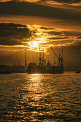 Fototapeta premium Hamburg, Germany - haffen at sunset with dramatic sky