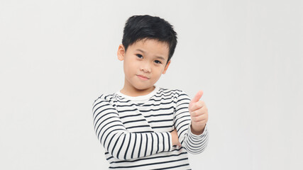 Asian little boy isolated smiling and raising thumb up