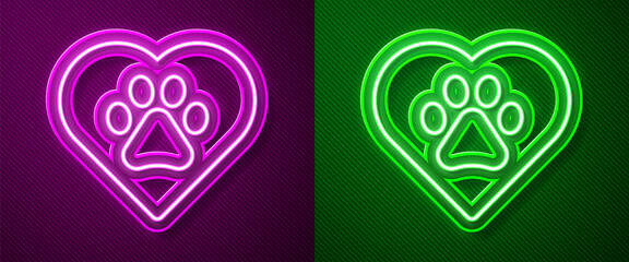 Glowing neon line Heart with animals footprint icon isolated on purple and green background. Pet paw in heart. Love to the animals. Vector.