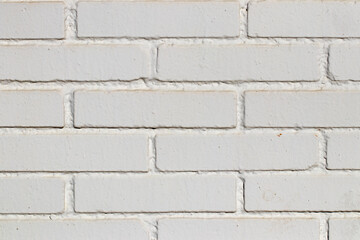 Stone texture background. Closeup of a old grunge white of a weathered brick wall texture. Abstract background concept, retro layout, interior design and wall banner. Macro photograph.