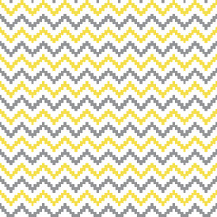 Geometric seamless pattern with yellow and gray pixel art zigzag lines on white. Abstract chevron vector pattern. Simple vector illustration. Geometric zigzag design for fabric, wallpaper, textile