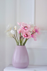 white and pink flowers in a vase 