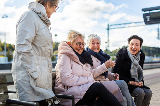 Senior women waiting at train platform