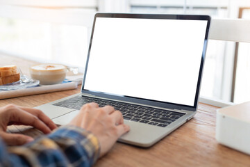 computer screen blank mockup.hand woman work using laptop with white background for advertising,contact business search information on desk at coffee shop.marketing and creative design