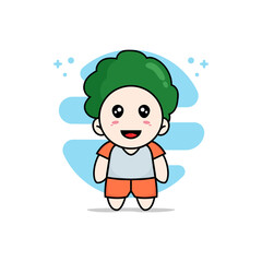 Cute kids character wearing broccoli costume.