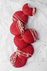 Red velvet cookies on a white plate and milk. Concept: breakfast, romance, valentines day. Top view. Copy space