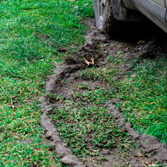 Fototapeta premium Dirty trail from the wheel of the car. Suv. Impassability.
