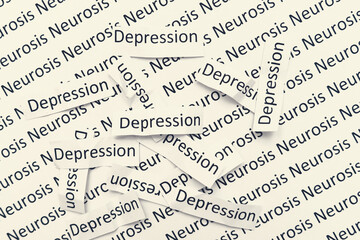 Signs words depression lying in a mess on a paper with neurosis sign, concept of sadness, apathy and low mood
