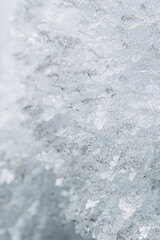 Close up sur des flocons de neige gelés - Arrière plan texturé neige glace