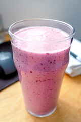 Raspberry, blueberry, mango, banana smoothie 