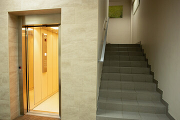 Elevator and stairs. Bright room