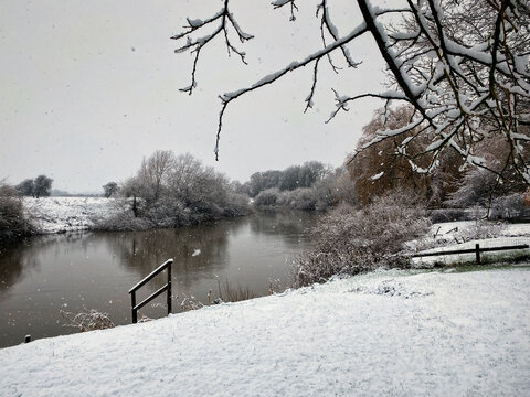 Snow falls over the river Ouse