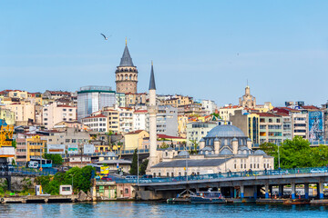 Fototapeta na wymiar Sokullu Mehmet Pasa Mosque and Halic Metro Bridge view in Istanbul