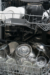 close-up of clean dishes inside the dishwasher