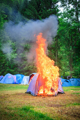 Burning Tent in the Woods at the Camp