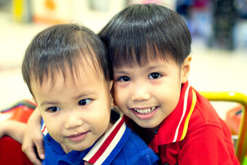 Happy faces of two sibling