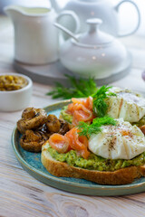 avocado toast, poached egg, smoked salmon, grilled mushrooms