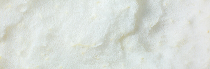 White peel texture inside grapefruit. Beige natural background.