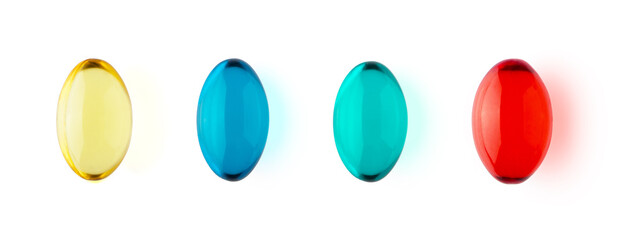Yellow, blue, green and red transparent capsules isolated on white background horizontal banner format. Healthcare and medicine concept. Omega 3, vitamin A and E, painkiller pills