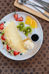 Cold crepes, vanilla ice cream with crepes and strawberry, sweet and desserts