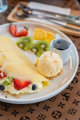 Cold crepes, vanilla ice cream with crepes and strawberry, sweet and desserts