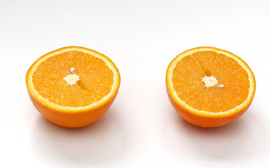 Orange cut half on white
