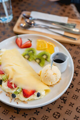 Cold crepes, vanilla ice cream with crepes and strawberry, sweet and desserts