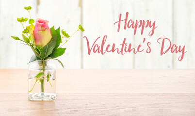 A rose in a glass vase - Happy Valentines day