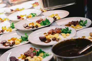 meat with vegetables on a buffet