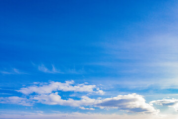 Naklejka na ściany i meble Sky with clouds, sunlight. Panarama of blue sky. Scenery. 