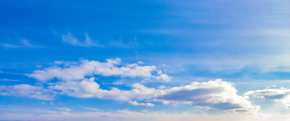 Obraz premium Sky with clouds, sunlight. Panarama of blue sky. Scenery. 