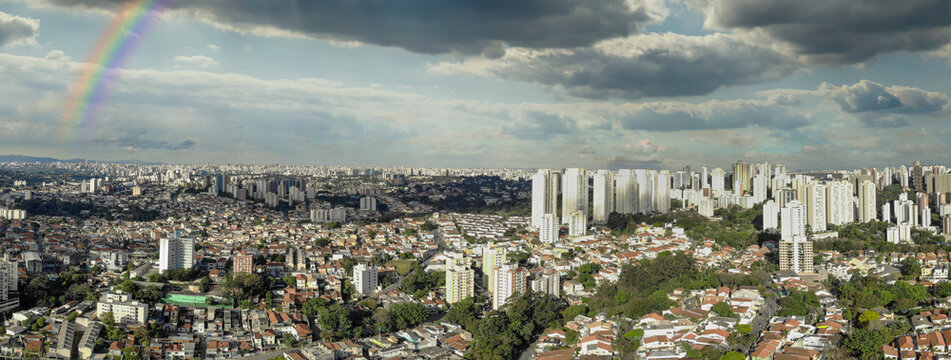 Aerial image of the city of São Paulo with rainbow