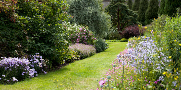 Old style country Scottish garden with mixed borders.
