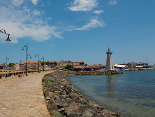 NESEBAR, BULGARIA - JUNE 07, 2019: monument near the entrance to old historical centre of the town Nesebar, UNESCO World heritage site.
