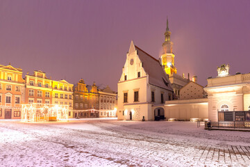 Poznan Town Hall on Old Market Square in Old Town in the snowy Christmas night, Poznan, Poland
