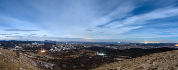 Night view of village in mountains during winter