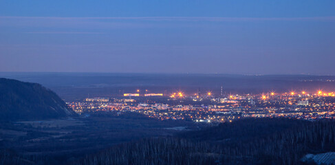 Night view of village in mountains during winter