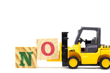 Toy forklift hold letter block o to complete word no on wood background