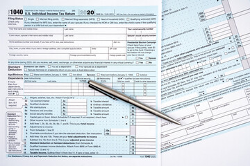 us individual income tax return 1040 form for 2020 with pen.
