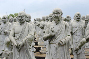 Fototapeta na wymiar Peaceful Ground & Realistic Statues in Tanjung Pinang, Indonesia
