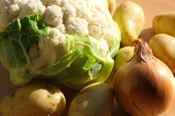 Prepared fresh raw vegetable mix for cooking consisting of cauliflower, potatoes and onion