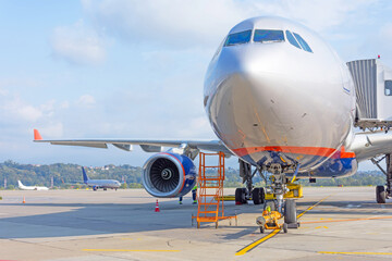 Airport view of the airfield, parking and aircraft movement.