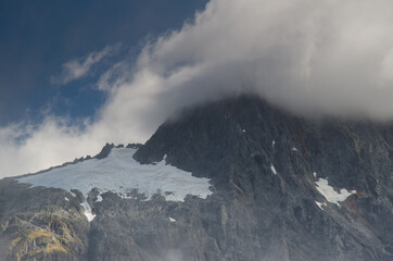 Mountain covered with clouds. Fiordland National Park. Southland. South Island. New Zealand.